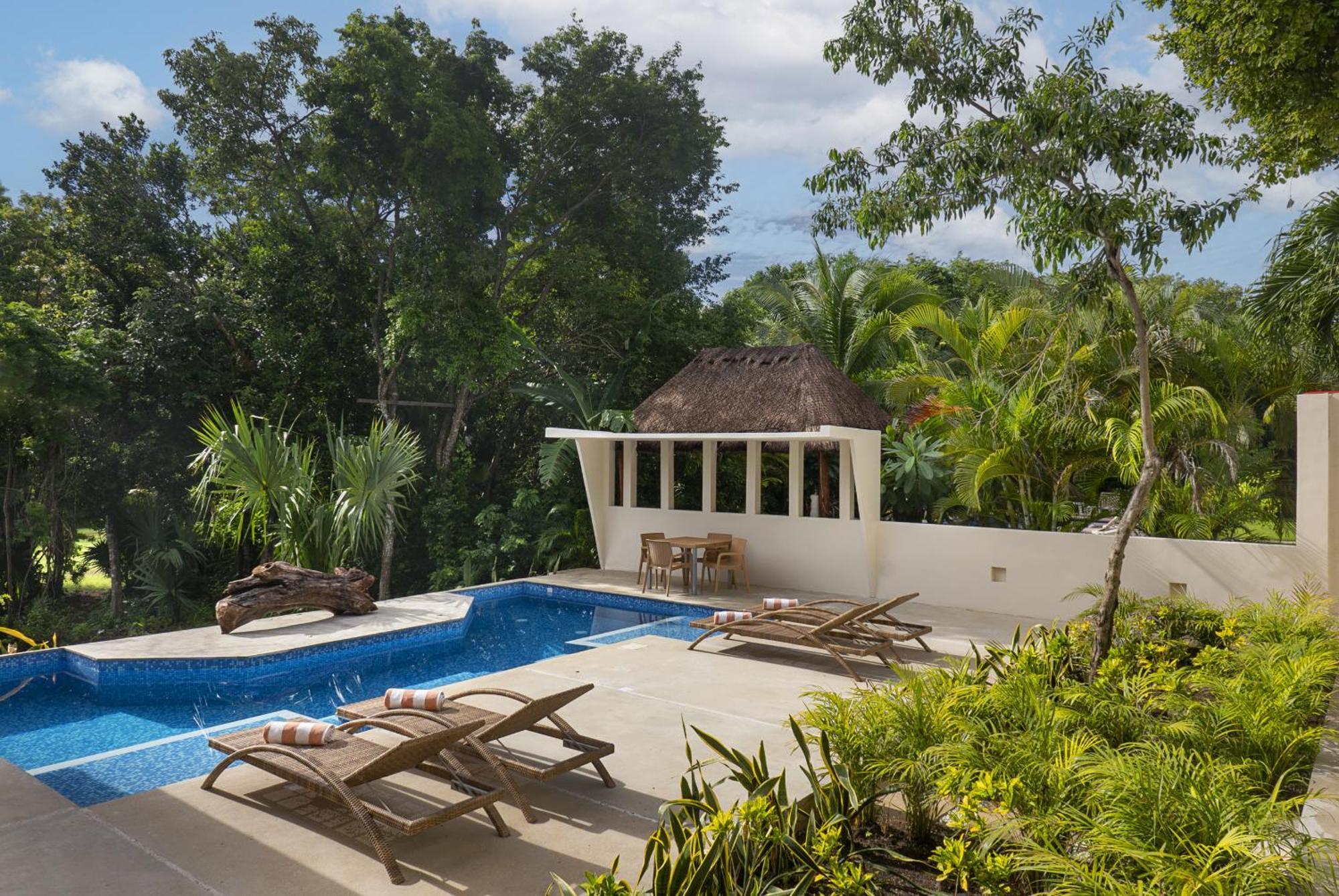 Ikana Puerto Aventuras Golf Getaway Exterior photo